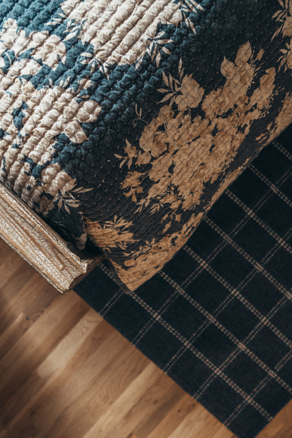 how to mix and match patterns, Patterned Area Rug in Home Decor, Close-Up of Mixed Patterned Fabrics for Home Textiles